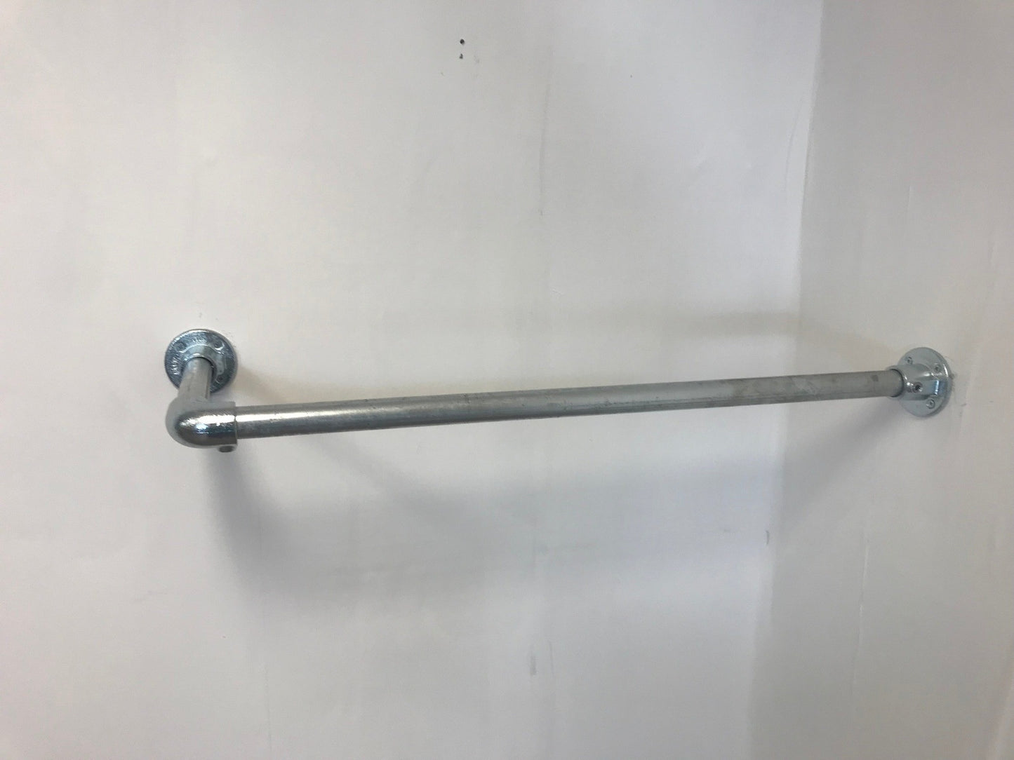 Corner fixed Clothing Rail in thick 33.7 tube, Including all wall fixings