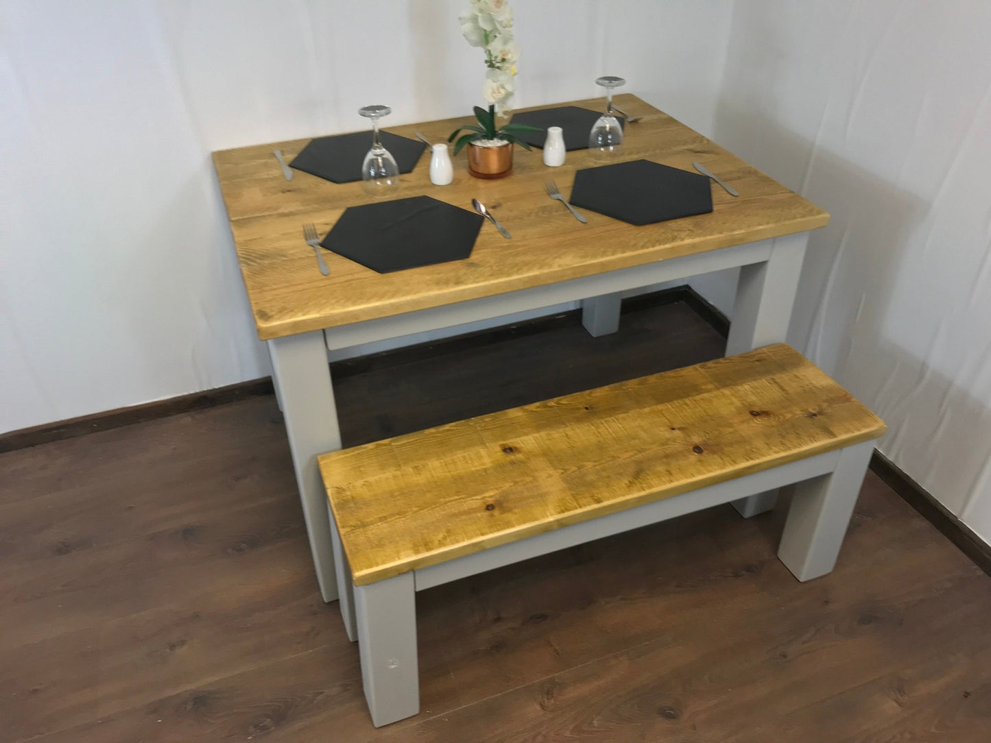 Dining Table and bench set. Farmhouse style hand painted legs using Little Green French grey. Rustic solid wood, hand stained Table top