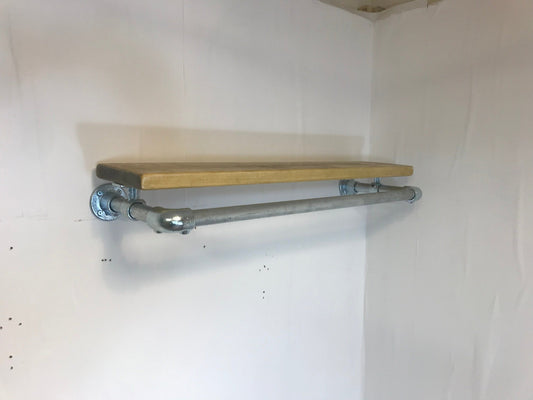Wall fixed clothing rail with wood shelf in various widths. Black or galvanised silver.